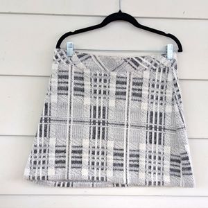 Express high-waisted, cozy, plaid, mini skirt in gray and white, size medium